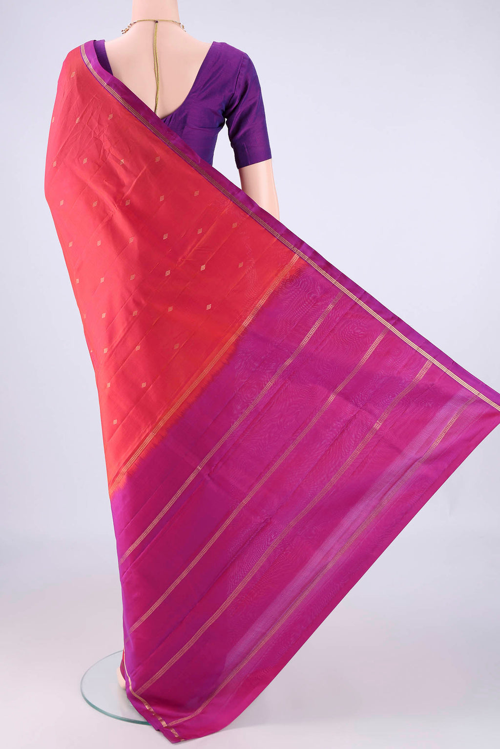 Flat view of Dark Pink Kanjivaram Silk Saree with Zari Butta on the body and Zari Border. 