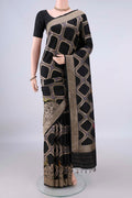 Pure Silk Black Banarasi Saree with Zari Butta on the body and Zari Border.  displayed on a mannequin
