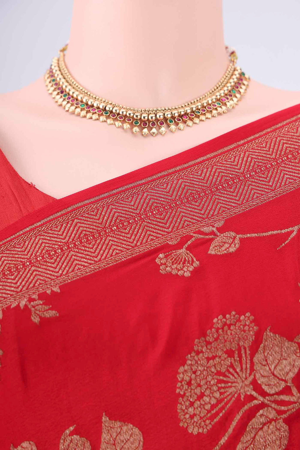 Border image of Red Banarasi Georgette Saree with Zari Brocade on the body and Zari Border. 