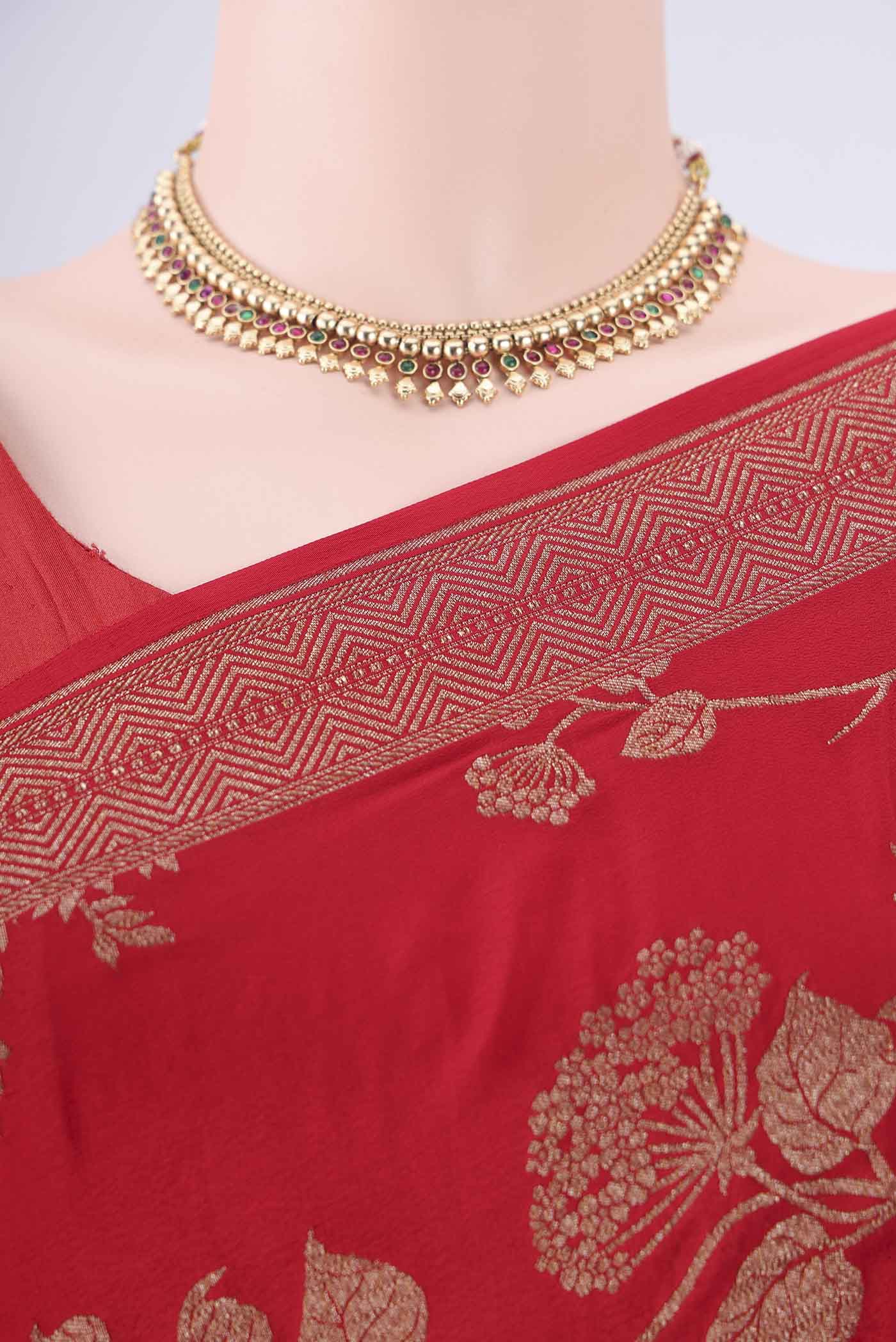 Border image of Red Banarasi Georgette Saree with Zari Brocade on the body and Zari Border. 