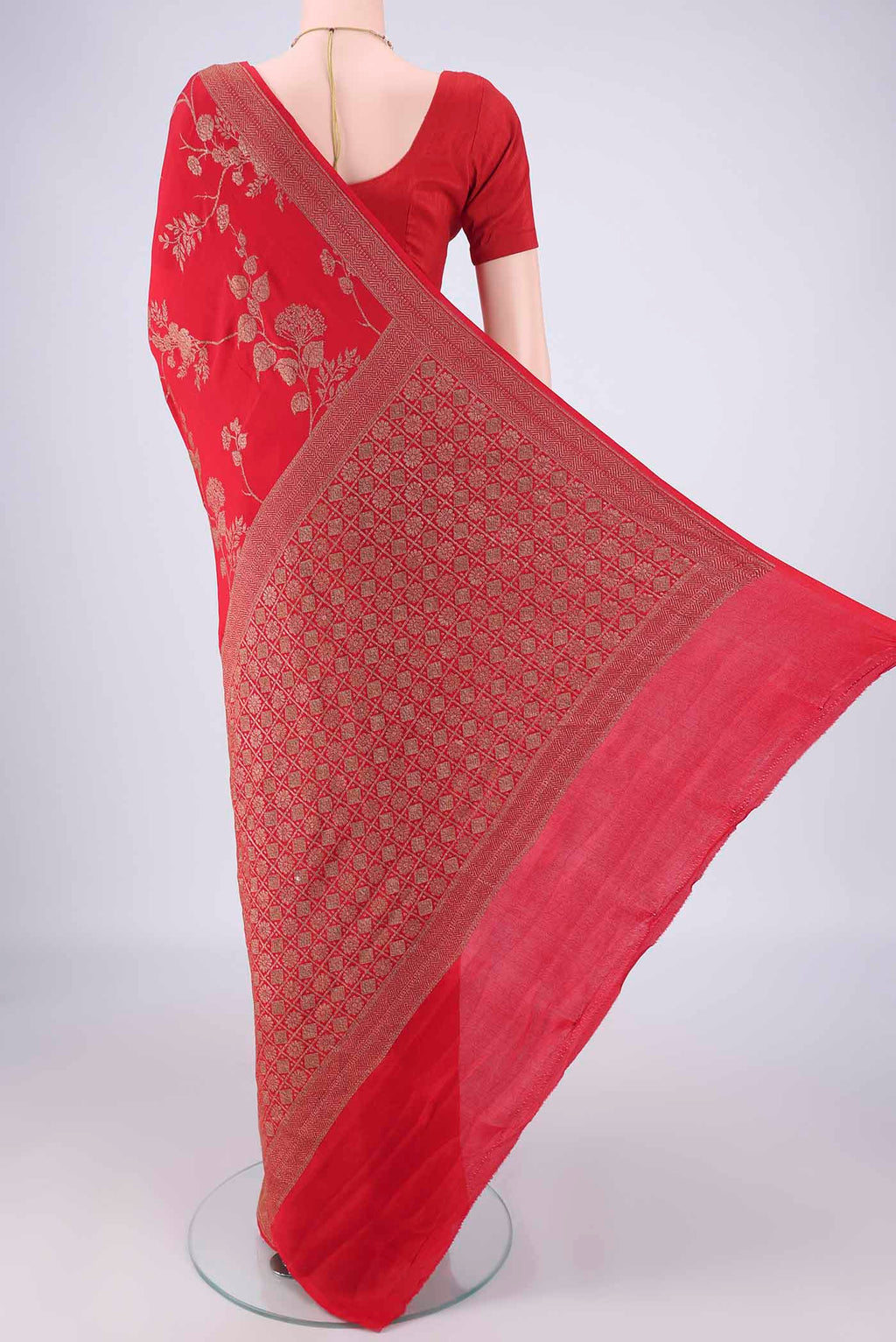 Flat view of Red Banarasi Georgette Saree with Zari Brocade on the body and Zari Border. 