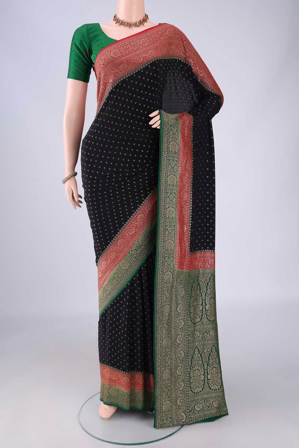 Black Banarasi Georgette Saree with Zari Butta on the body and Zari Border.  displayed on a mannequin