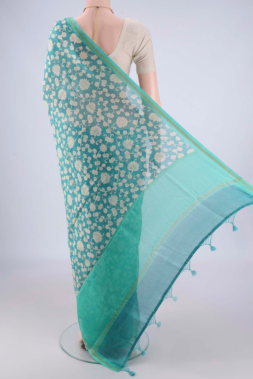 Flat view of Blue Chanderi Silk Cotton Saree with Printed design on the body and Thread Border. 