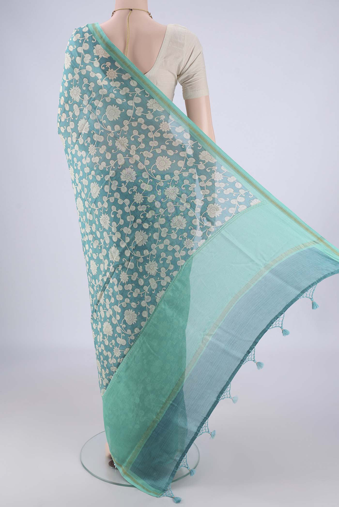 Flat view of Blue Chanderi Silk Cotton Saree with Printed design on the body and Thread Border. 
