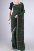 Olive Green Maheshwari Cotton Saree with Printed design on the body and Zari Border.  displayed on a mannequin