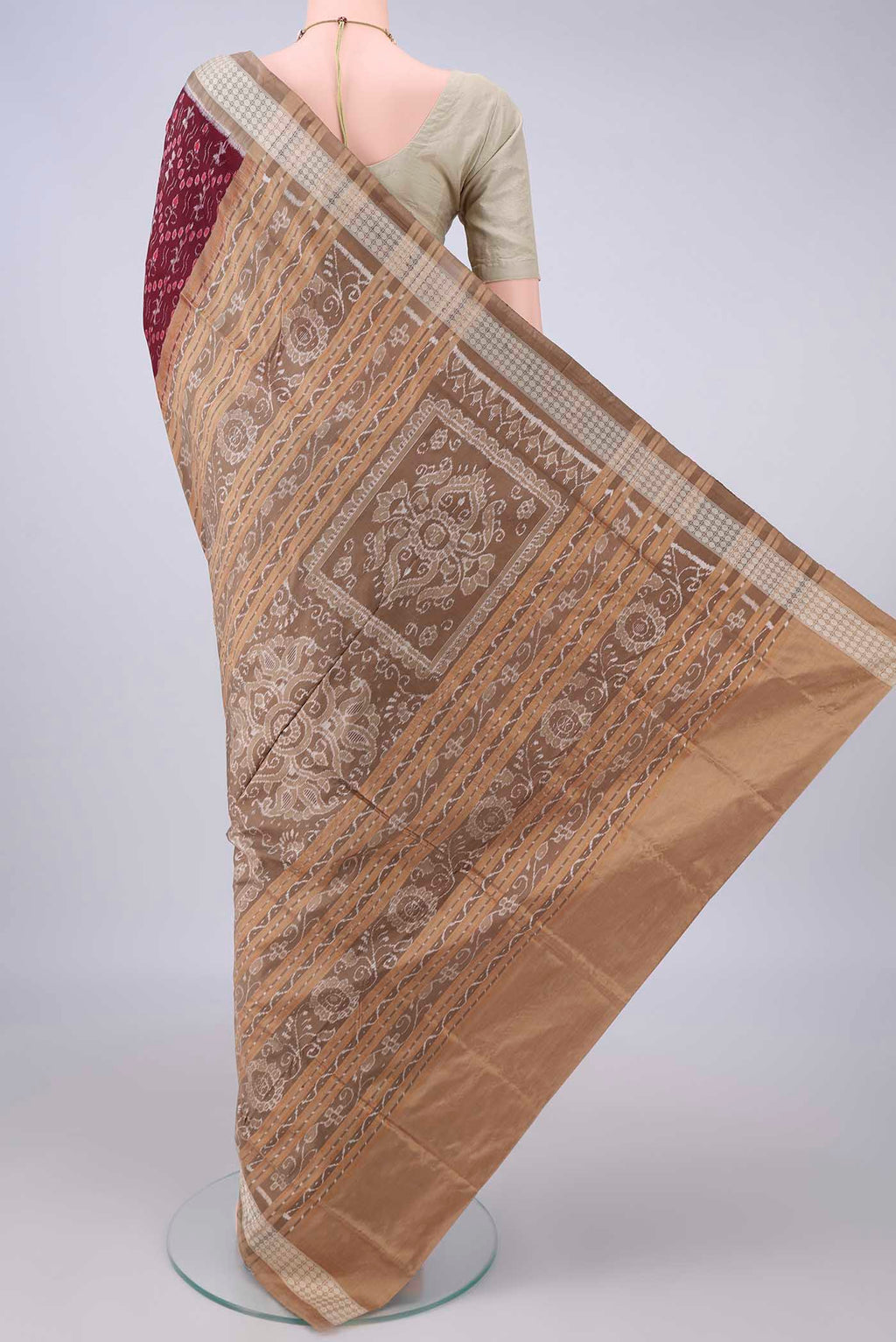 Flat view of Pure Silk Maroon Orissa Saree with Pure Ikat on the body and Thread Border. 