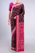 Pure Silk Coffee Brown Orissa Ikat Saree with Ikat design on the body and Thread Border.  displayed on a mannequin