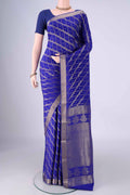 Royal Blue Mysore Crepe Saree with Zari Brocade on the body and Zari Border.  displayed on a mannequin