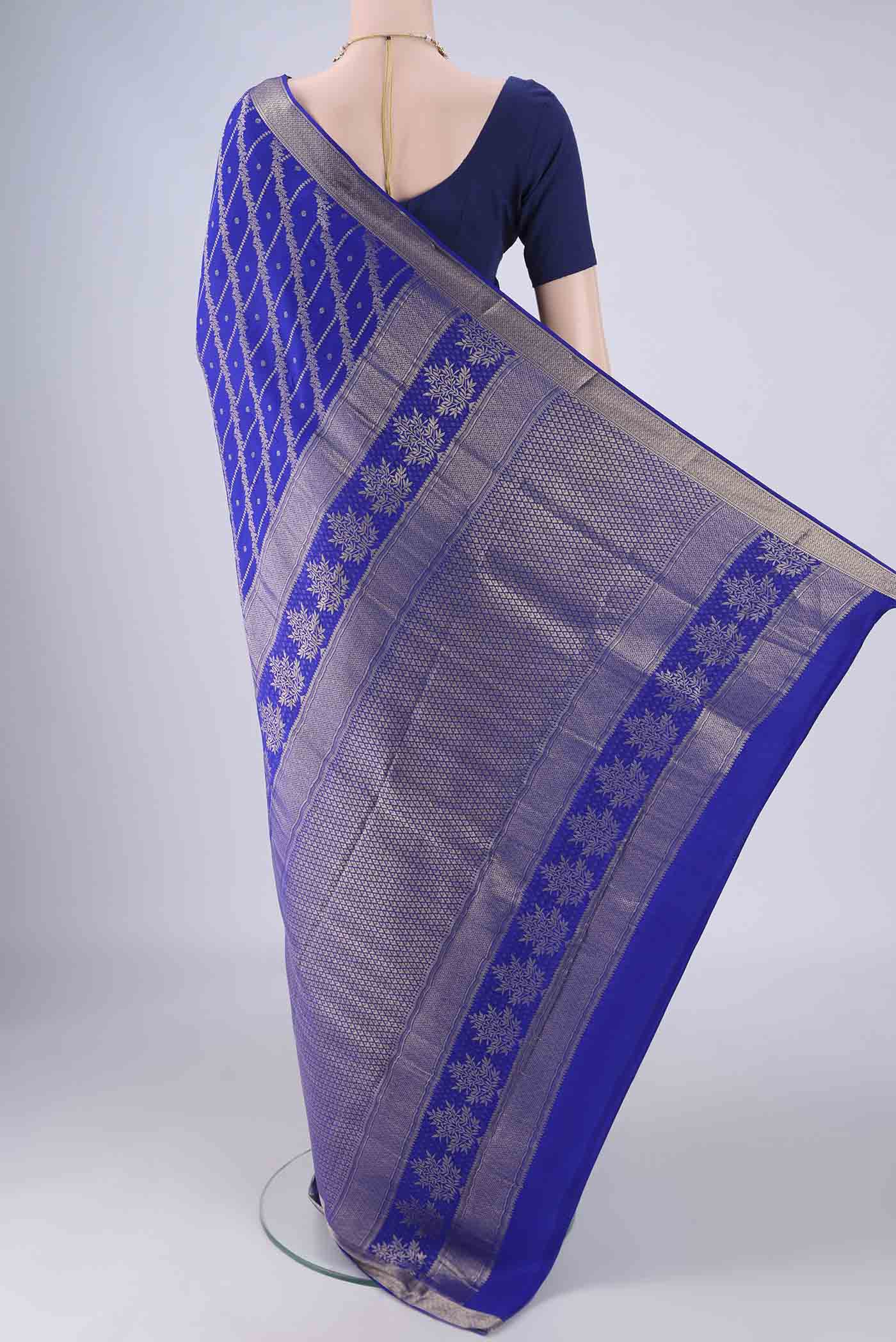 Flat view of Royal Blue Mysore Crepe Saree with Zari Brocade on the body and Zari Border. 