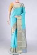 Sky Blue Kanchipuram Silk Saree with Zari Butta on the body and Zari Border.  displayed on a mannequin