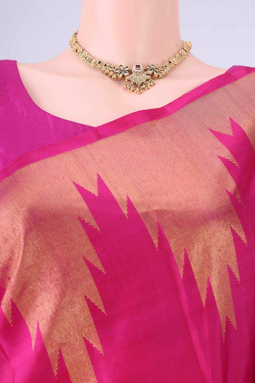 Border image of Rani Pink Kanchipuram Silk Saree with Plain Body and Temple Border. 