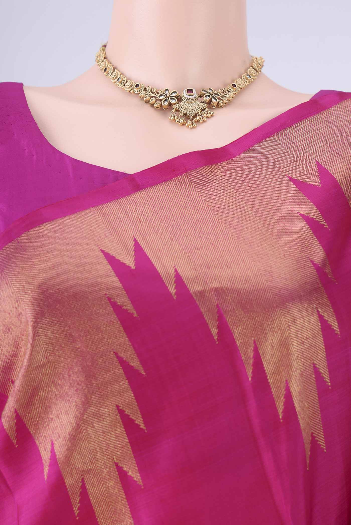 Border image of Rani Pink Kanchipuram Silk Saree with Plain Body and Temple Border. 