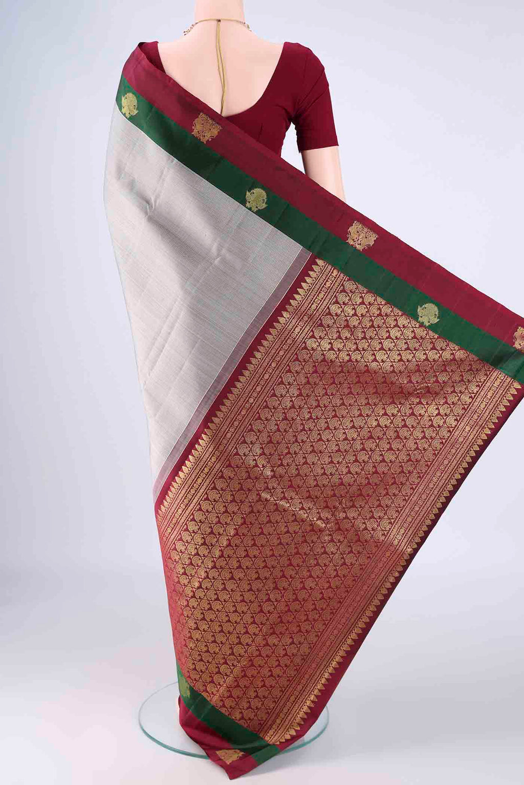 Flat view of Grey Kanjivaram Silk Saree with Checked design on the body and Zari Border. 