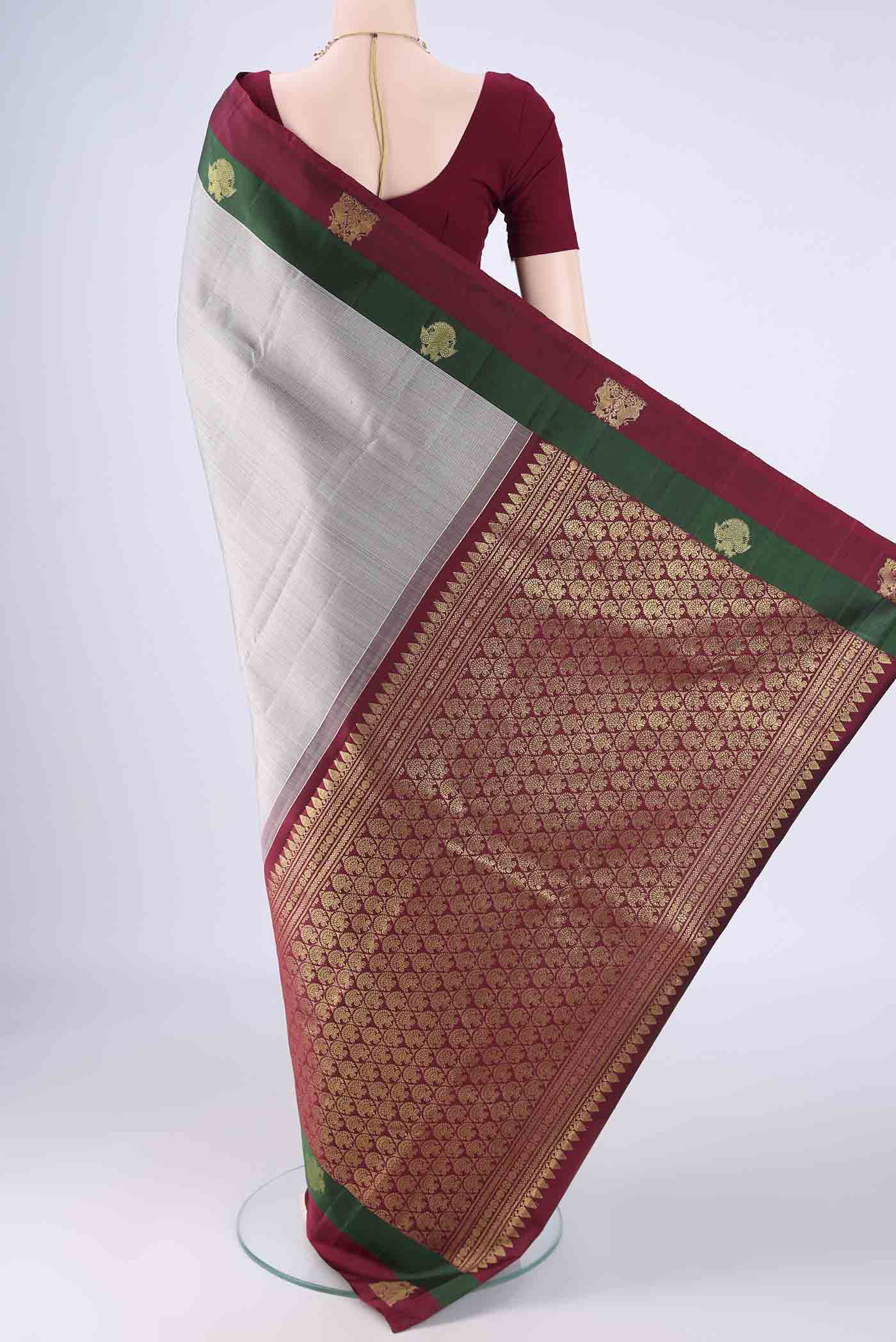 Flat view of Grey Kanjivaram Silk Saree with Checked design on the body and Zari Border. 