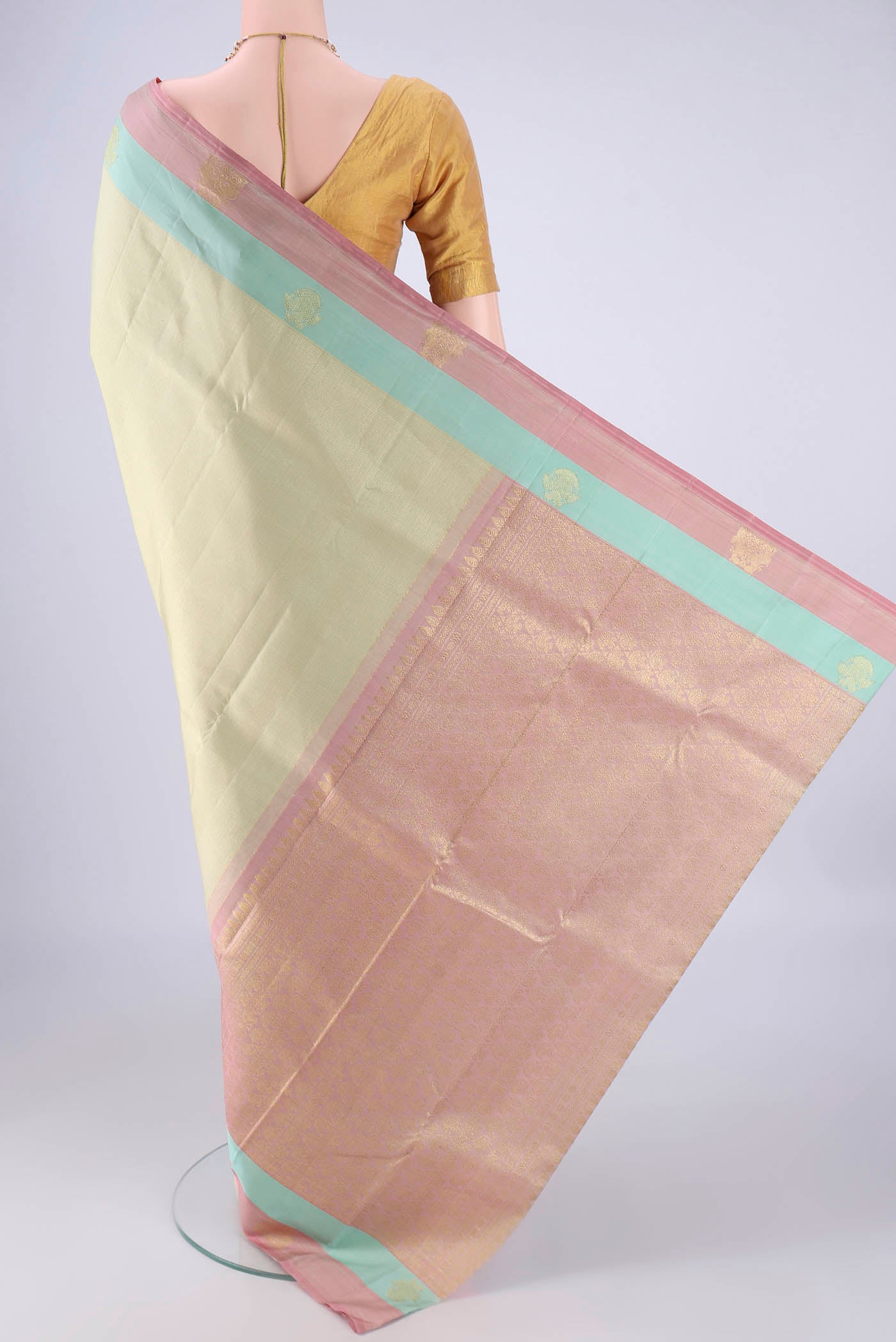 Flat view of Beige Kanjivaram Silk Saree with Checked design on the body and Zari Border. 