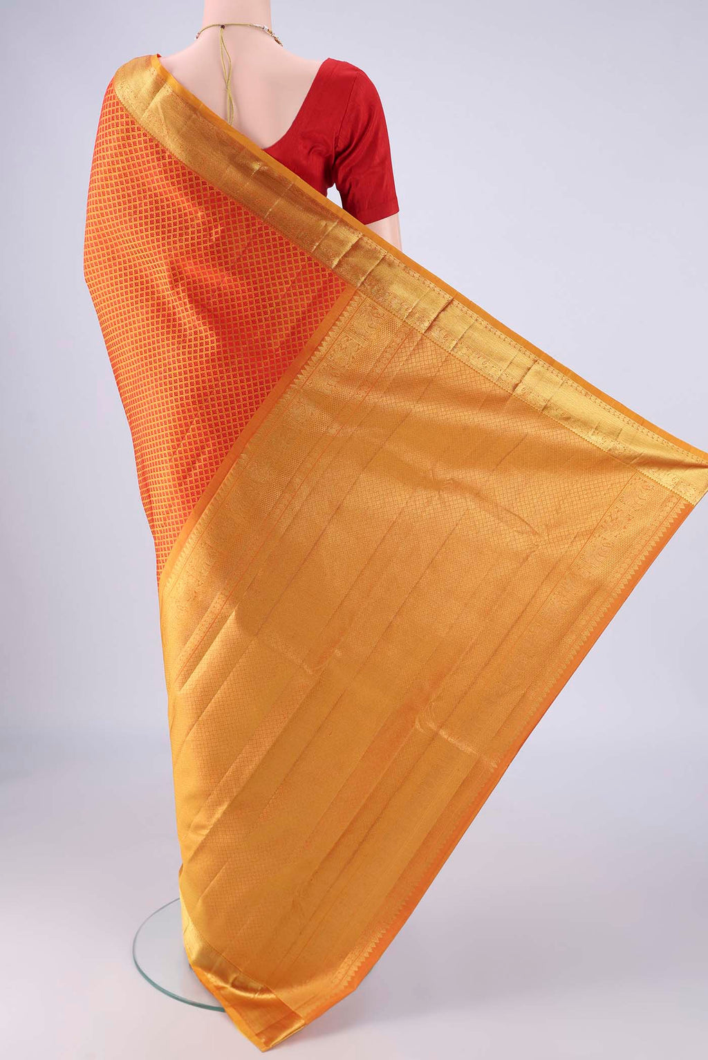 Flat view of Mustard Kanjivaram Silk Saree with Jacquard design on the body and Zari Border. 