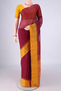 Maroon Kanchi Cotton Saree with Plain Body and Temple Thread Border.  displayed on a mannequin