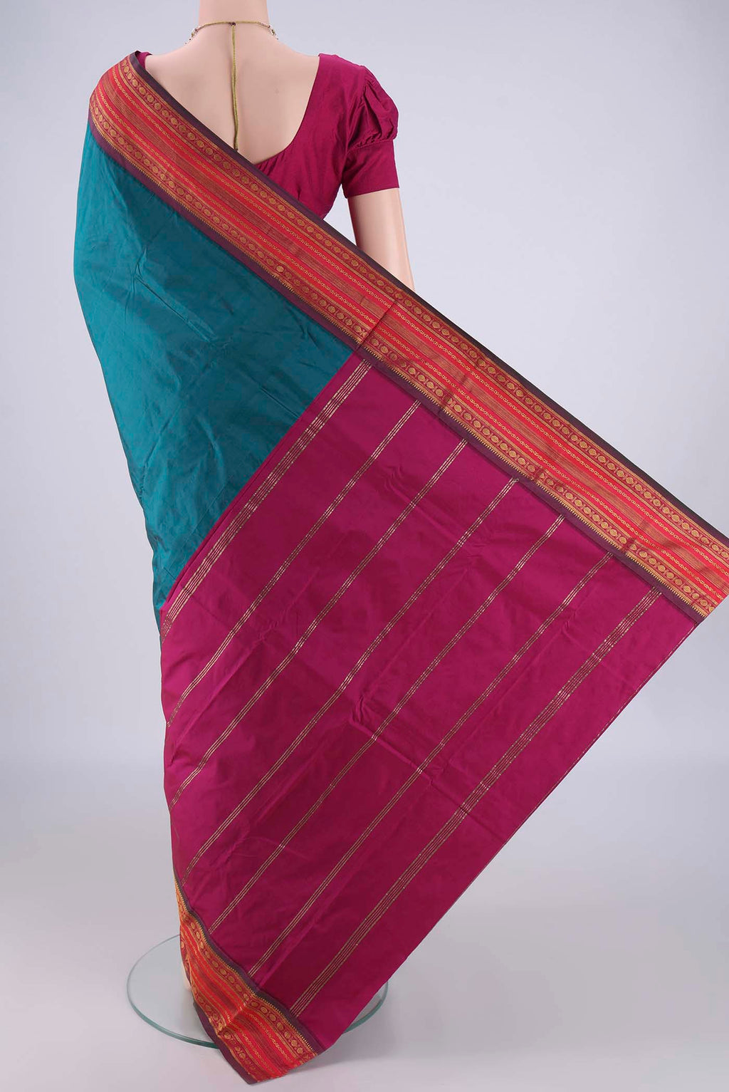 Flat view of Peacock Blue Blended Bangalore Silk Saree with Plain Body and Zari Border. 