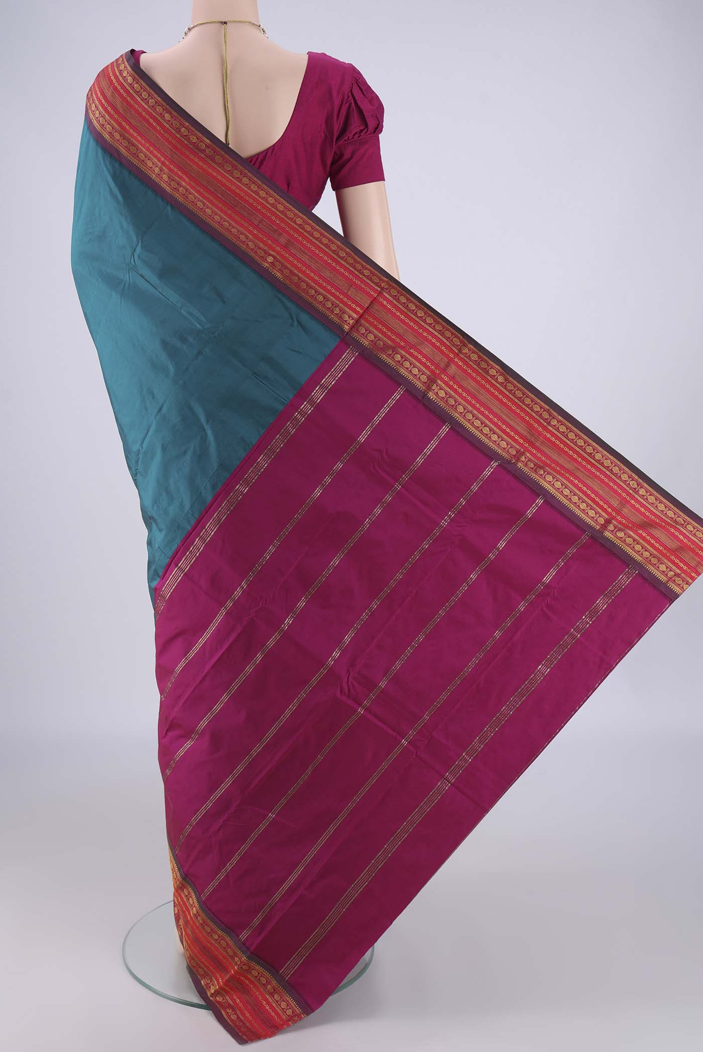 Flat view of Peacock Blue Blended Bangalore Silk Saree with Plain Body and Zari Border. 