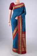 Dark Blue Blended Bangalore Silk Saree with Zari Butta on the body and Zari Border.  displayed on a mannequin