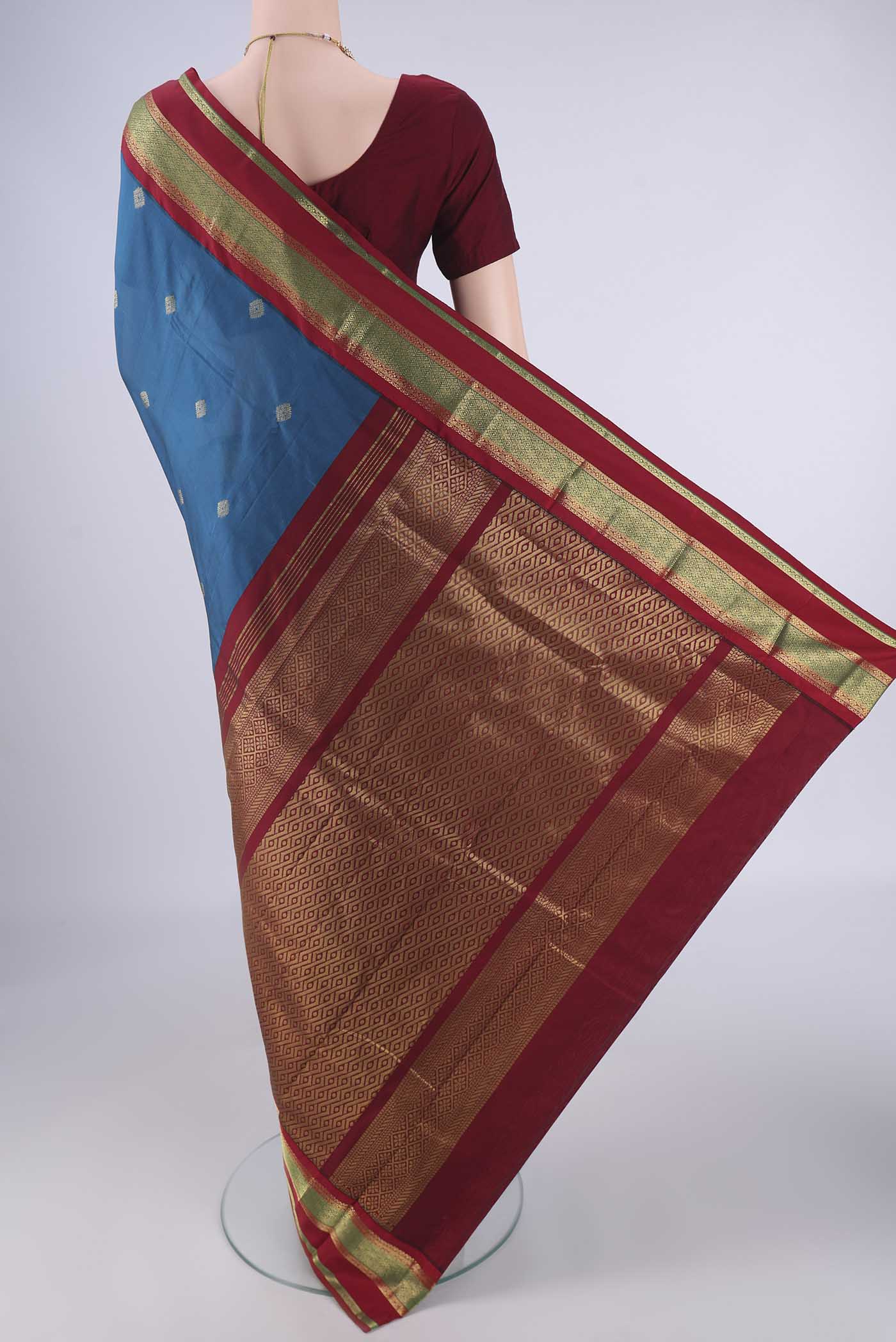 Flat view of Dark Blue Blended Bangalore Silk Saree with Zari Butta on the body and Zari Border. 