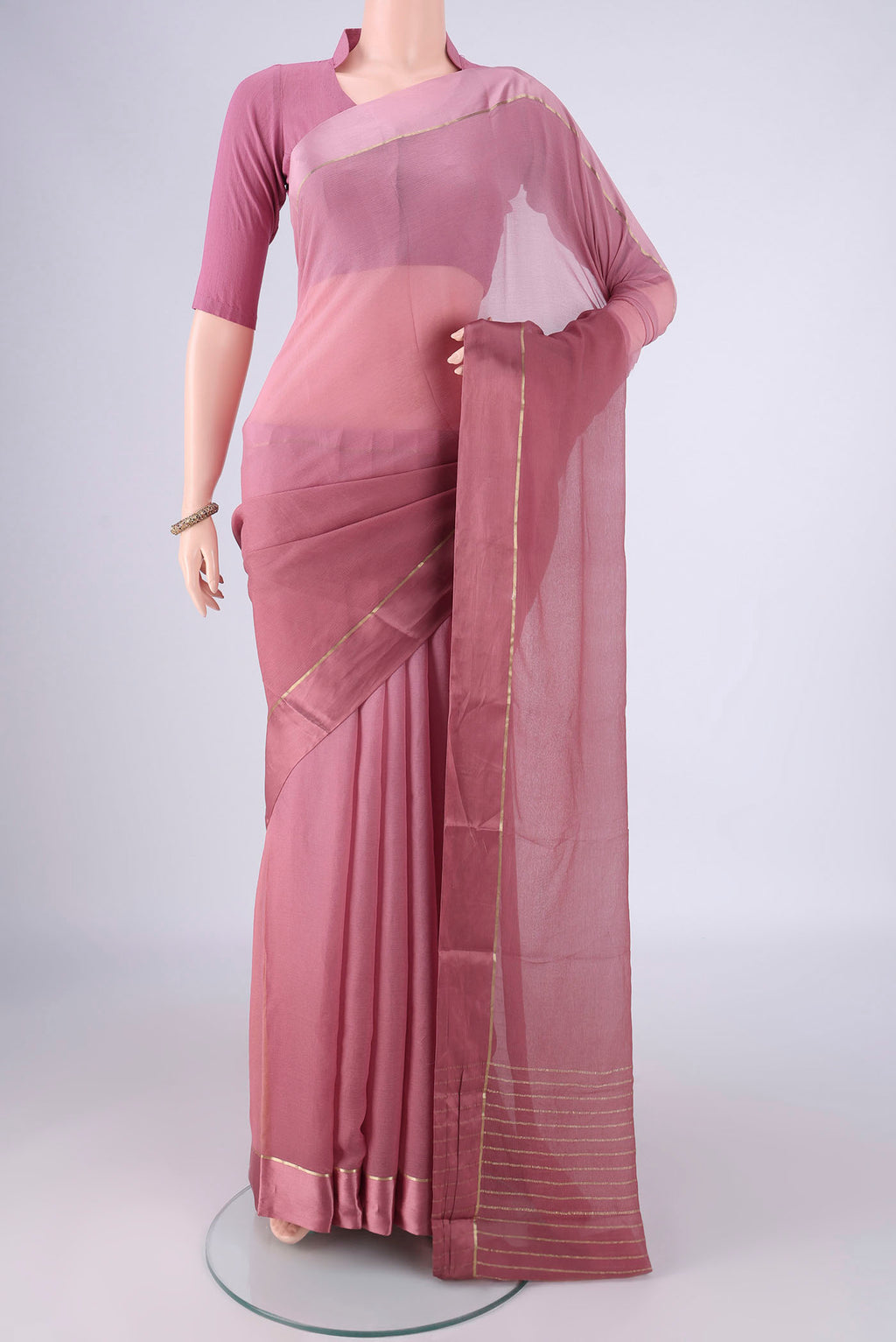 Mauve Mysore Chiffon Saree with Plain Body and Plain Border.  displayed on a mannequin
