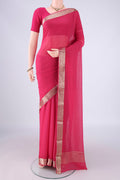 Pink Mysore Georgette Saree with Plain Body and Zari Border.  displayed on a mannequin