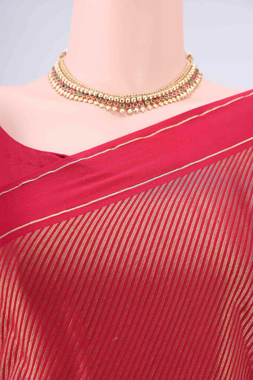 Border image of Rani Pink Mysore Crepe Saree with Zari Brocade on the body and Zari Border. 