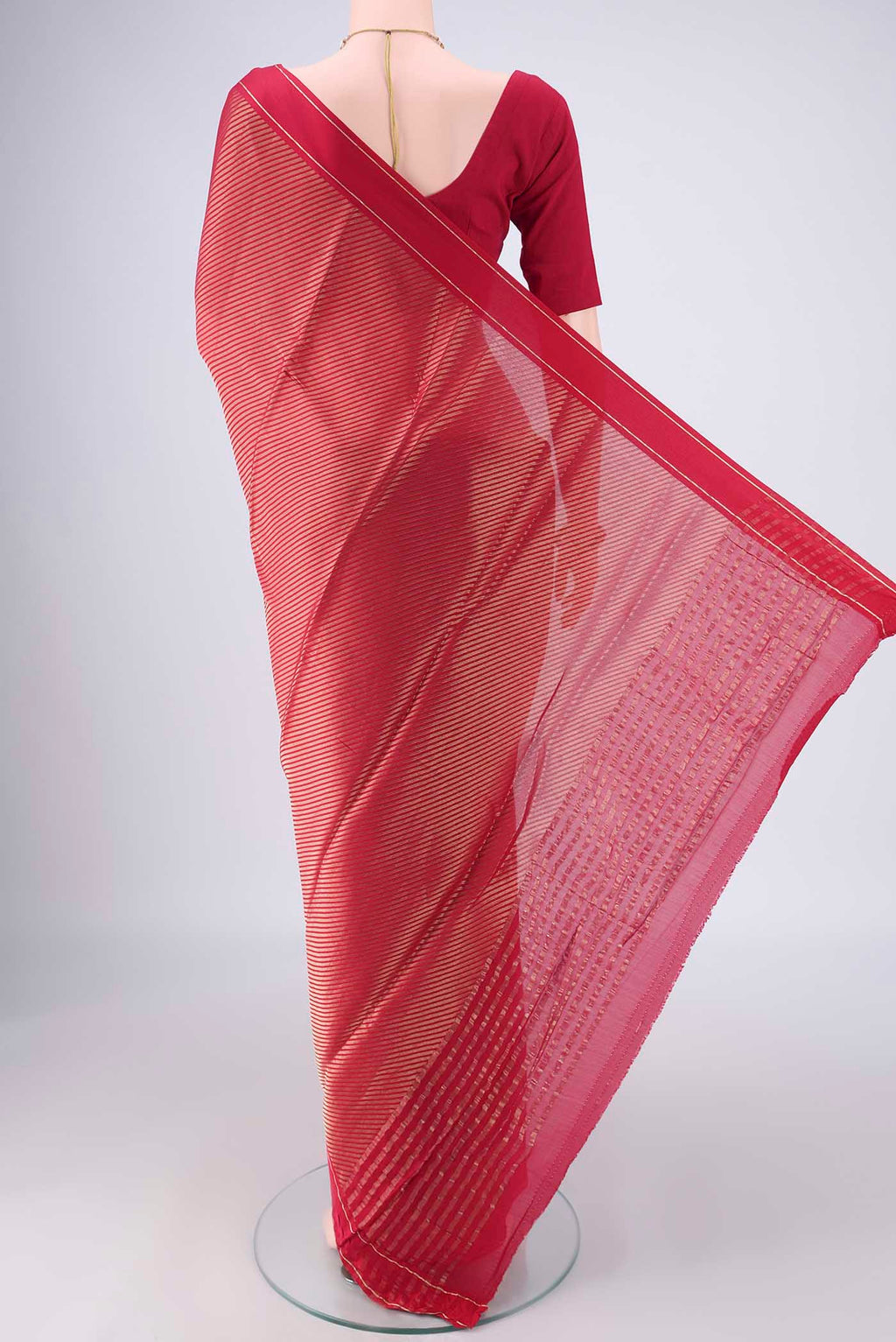 Flat view of Rani Pink Mysore Crepe Saree with Zari Brocade on the body and Zari Border. 