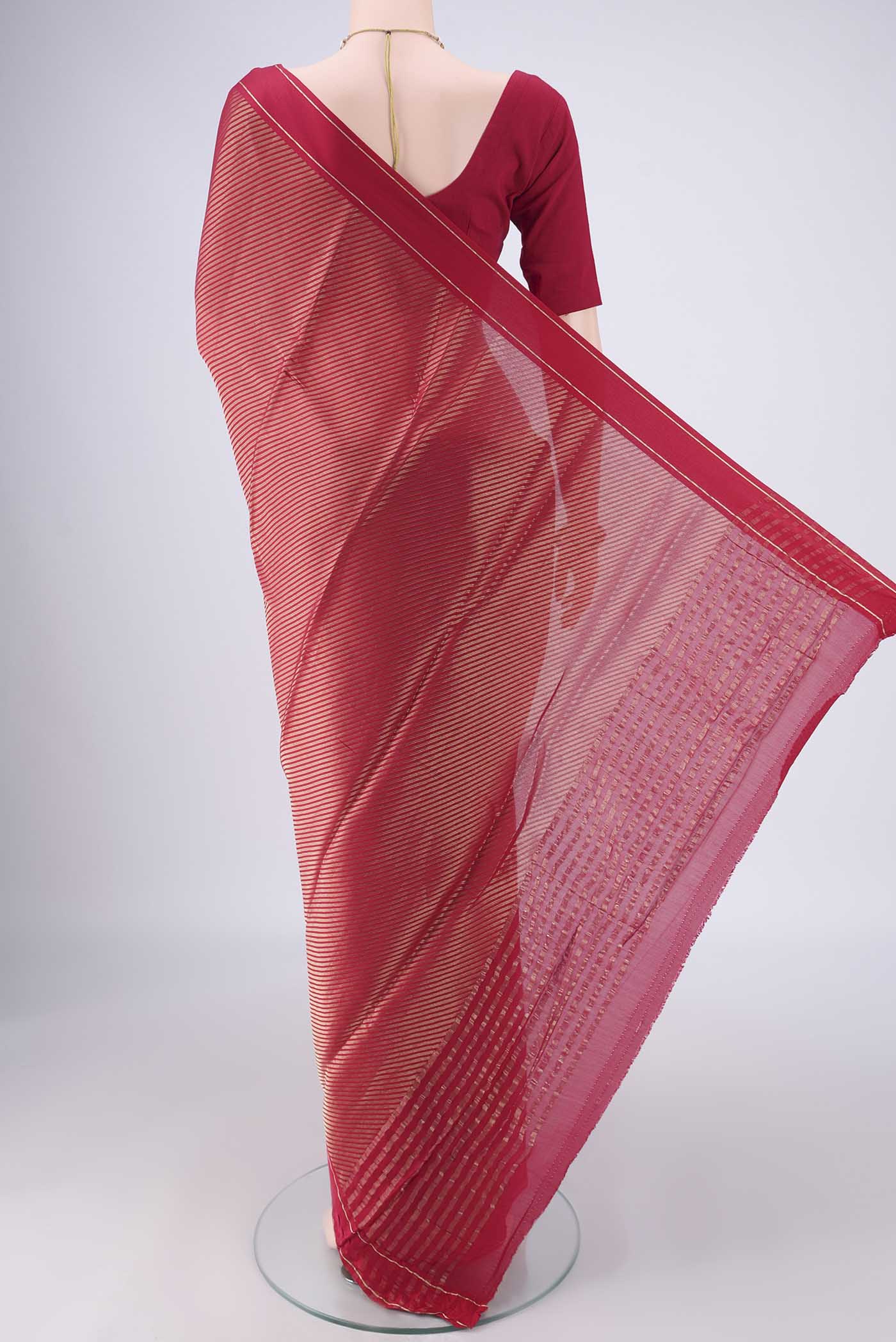 Flat view of Rani Pink Mysore Crepe Saree with Zari Brocade on the body and Zari Border. 