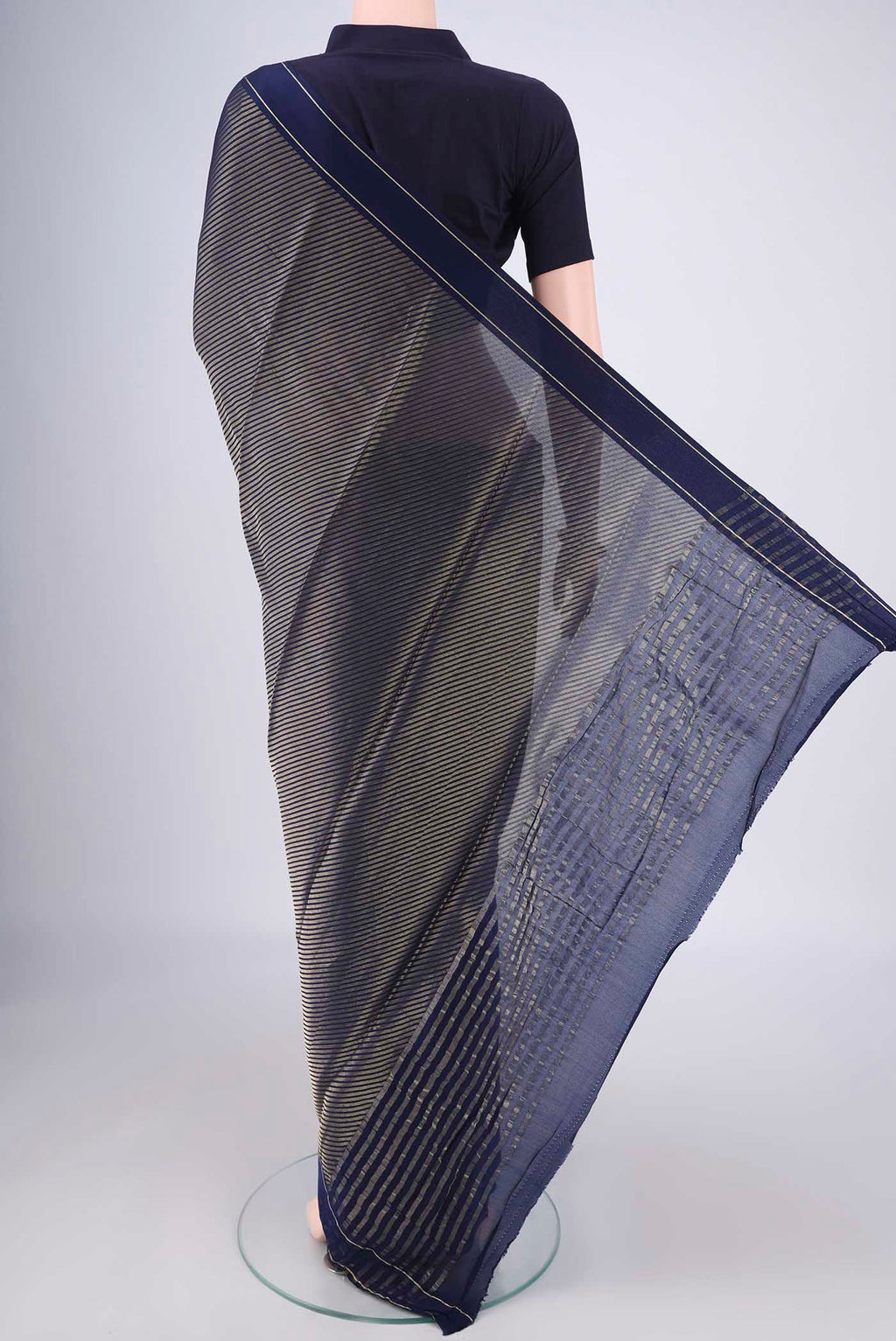 Flat view of Navy Blue Mysore Crepe Saree with Zari Brocade on the body and Zari Border. 