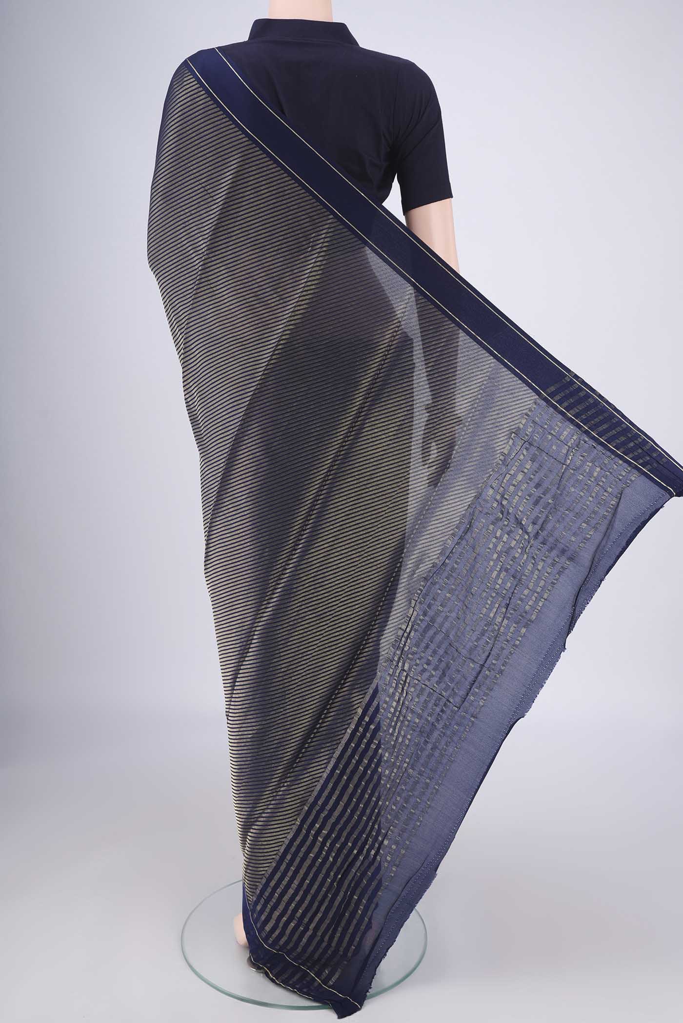 Flat view of Navy Blue Mysore Crepe Saree with Zari Brocade on the body and Zari Border. 