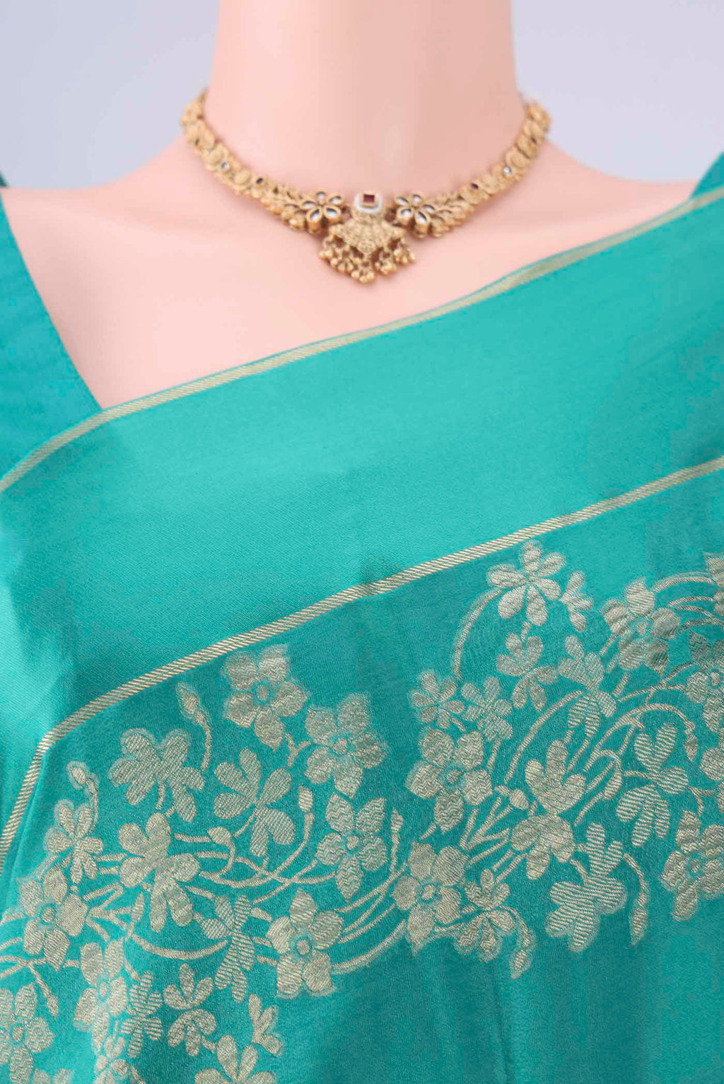 Border image of Sea Green Mysore Crepe Saree with Zari Butta on the body and Thin Zari Line. 