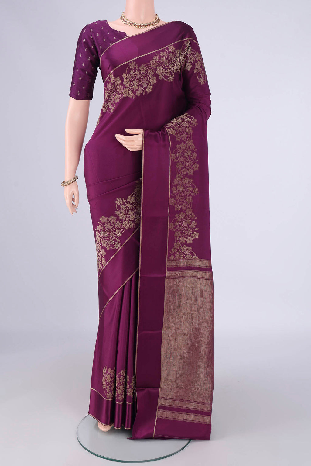 Purple Mysore Crepe Saree with Plain Body and Zari Border.  displayed on a mannequin