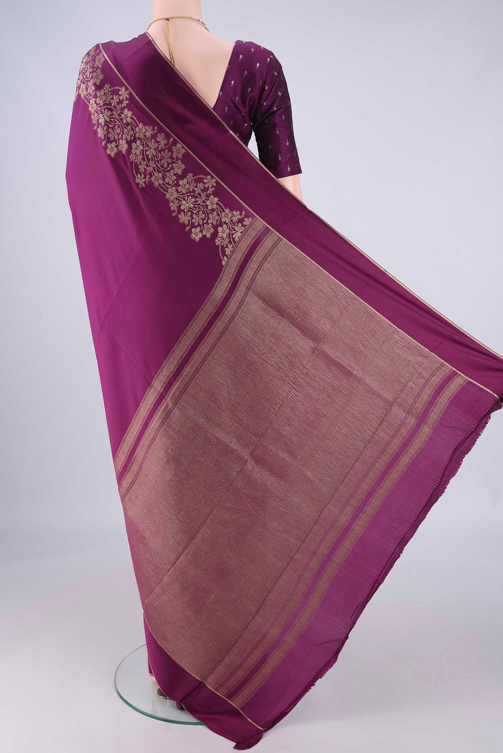 Flat view of Purple Mysore Crepe Saree with Plain Body and Zari Border. 