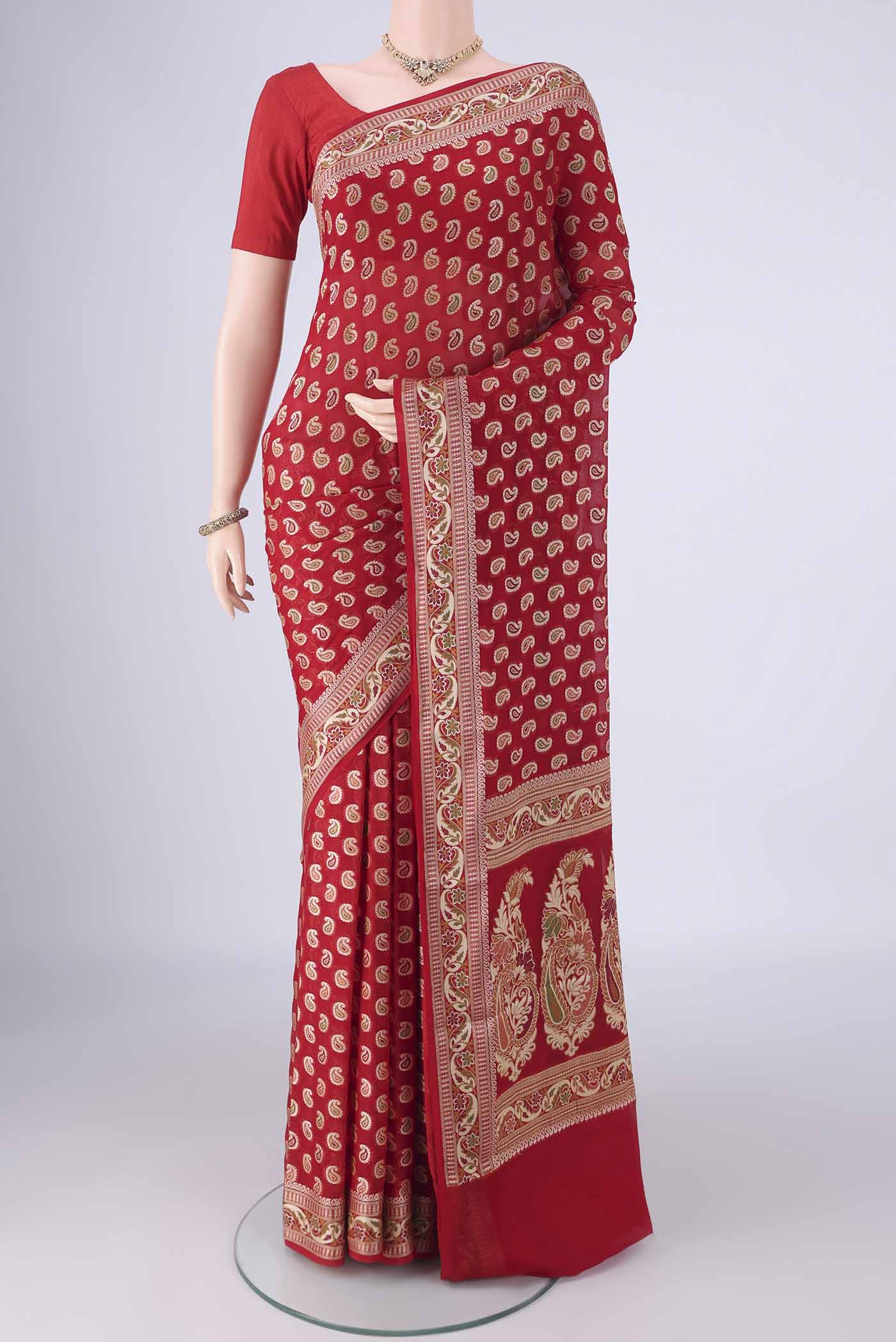 Red Blended Banarasi Georgette Saree with Thread Butta on the body and Zari And Thread Border.  displayed on a mannequin