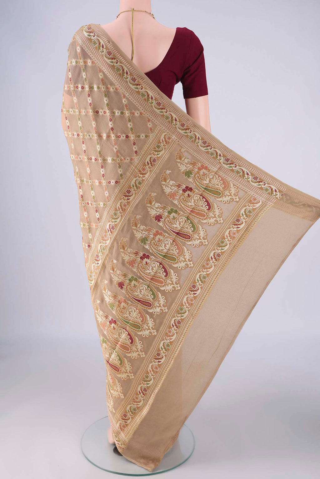Flat view of Beige Blended Banarasi Georgette Saree with Thread Brocade on the body and Zari And Thread Border. 