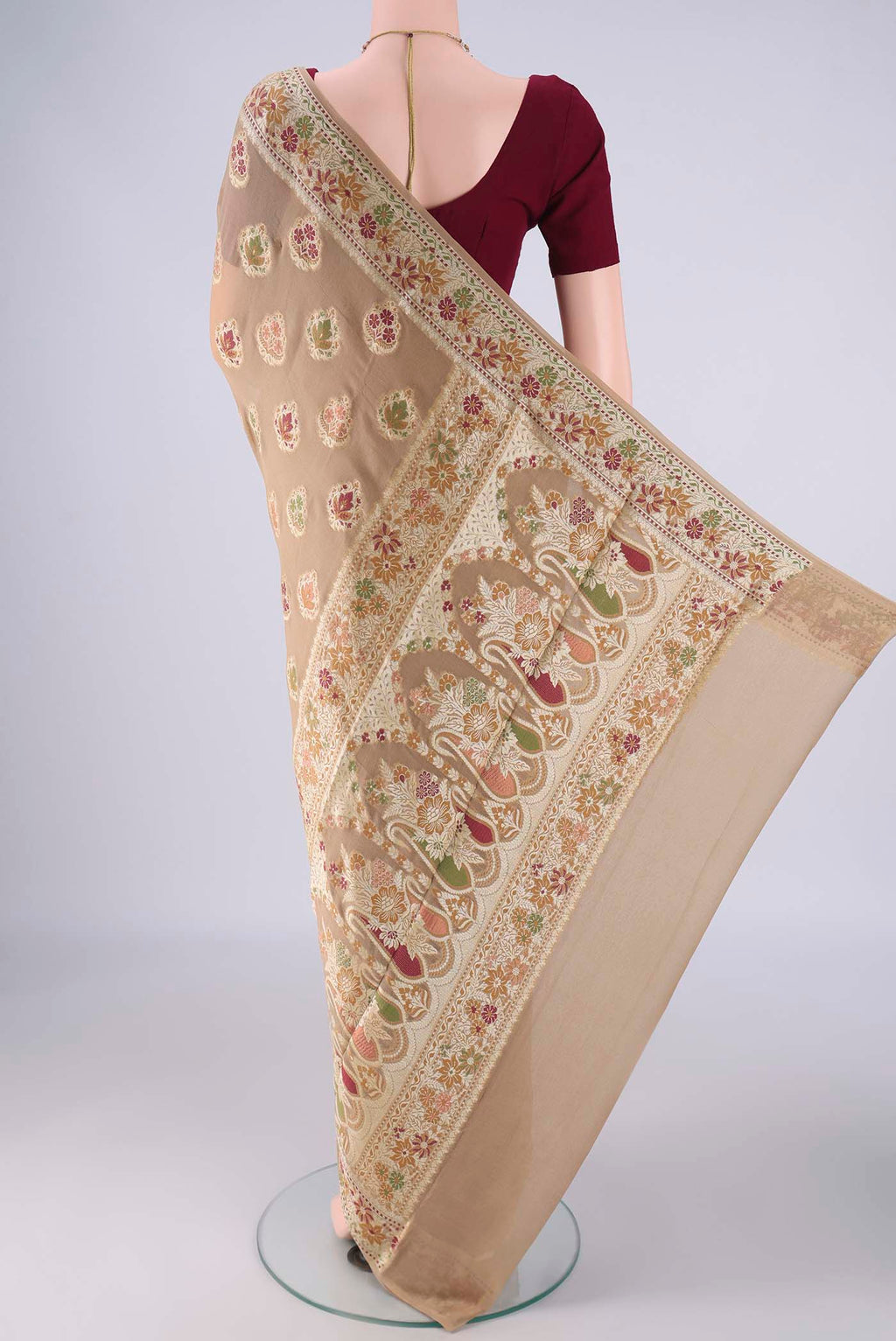 Flat view of Beige Blended Banarasi Georgette Saree with Zari And Thread Butta on the body and Zari And Thread Border. 