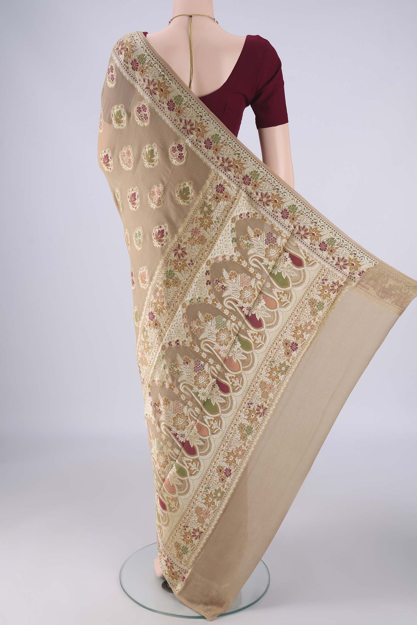 Flat view of Beige Blended Banarasi Georgette Saree with Zari And Thread Butta on the body and Zari And Thread Border. 