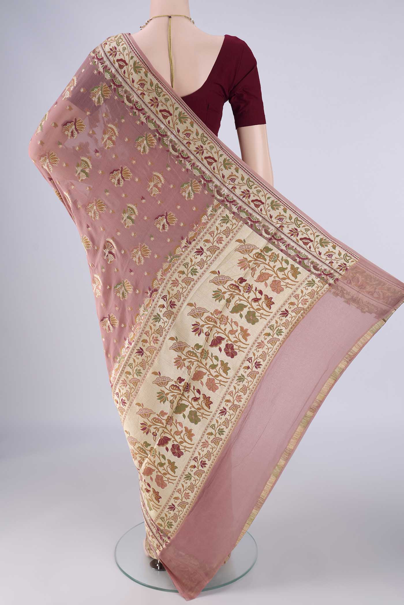 Flat view of Rose Gold Blended Banarasi Georgette Saree with Zari And Thread Butta on the body and Zari And Thread Border. 