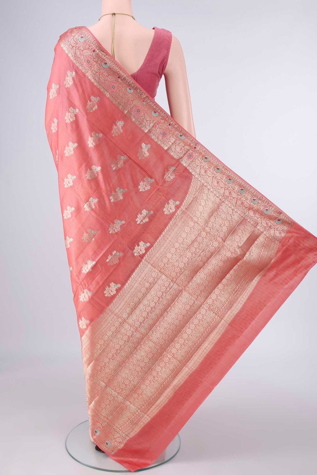 Flat view of Peach Banarasi Tussar Saree with Zari And Thread Butta on the body and Zari And Thread Border. 
