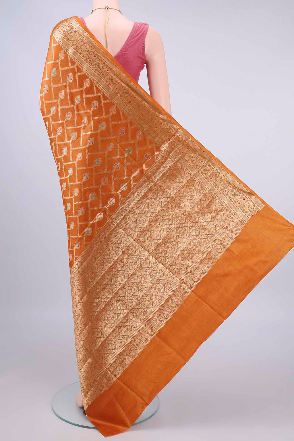Flat view of Mustard Banarasi Tussar Saree with Zari And Thread Butta on the body and Zari Border. 