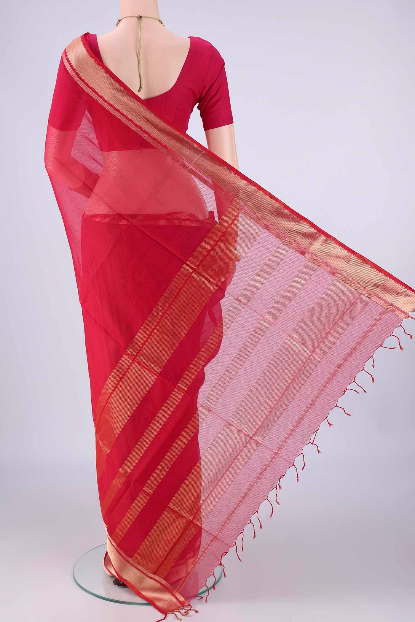 Flat view of Dark Pink Maheshwari Silk Cotton Saree with Stripes on the body and Zari Border. 
