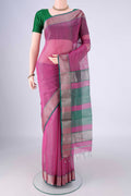 Magenta Maheshwari Silk Cotton Saree with Stripes on the body and Zari Border.  displayed on a mannequin