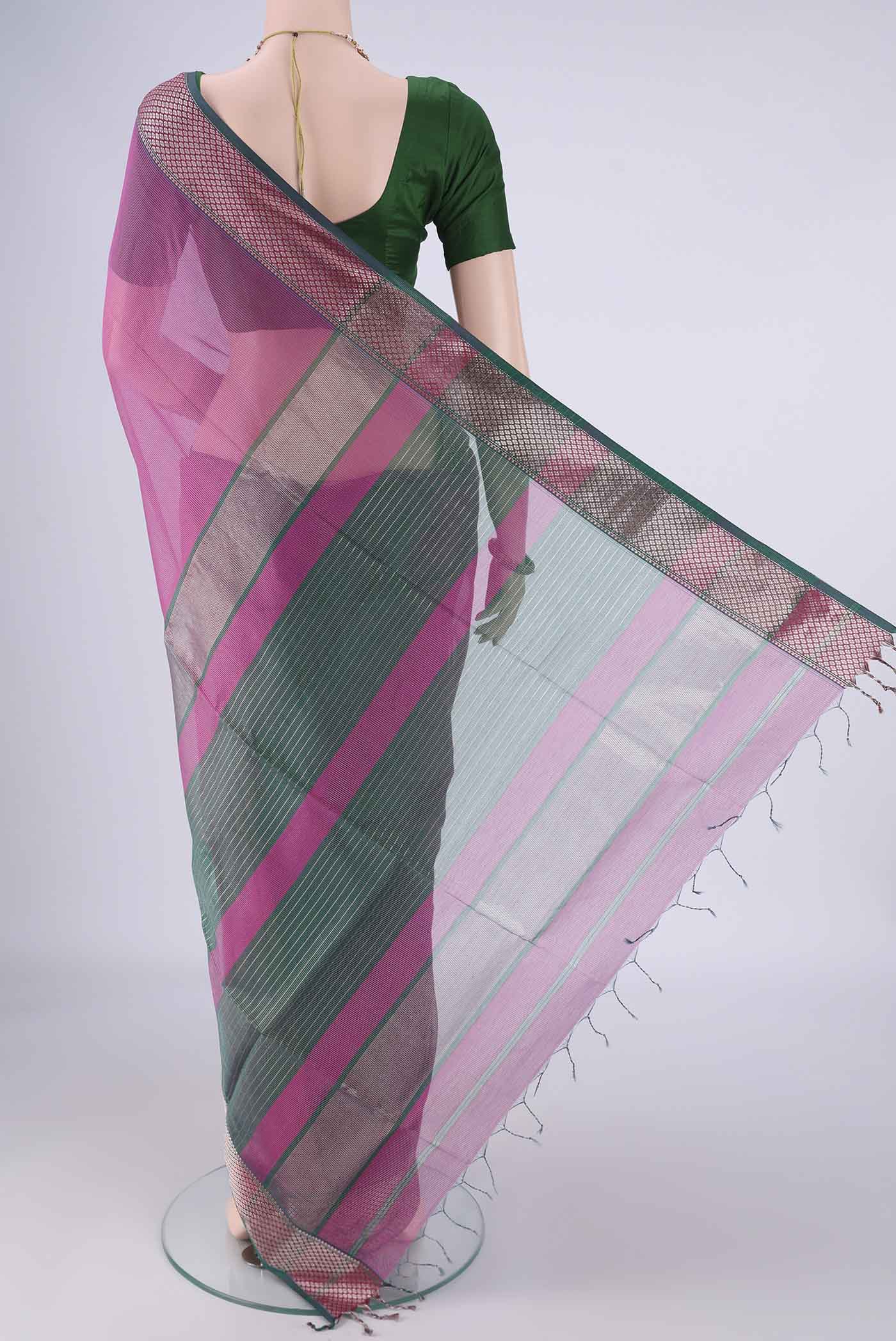 Flat view of Magenta Maheshwari Silk Cotton Saree with Stripes on the body and Zari Border. 