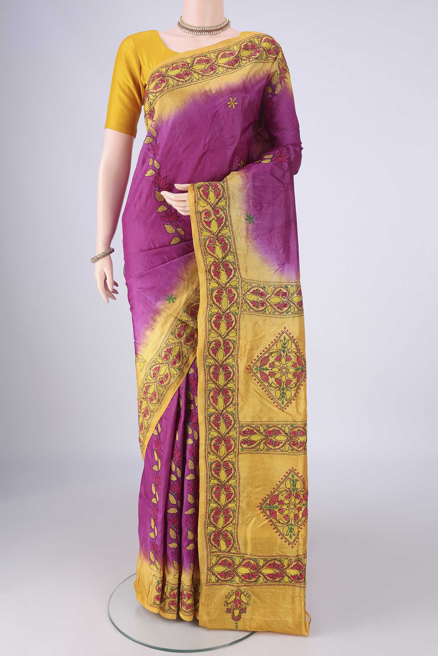 Magenta Tussar Silk Saree with Kantha Work on the body and Thread Border.  displayed on a mannequin
