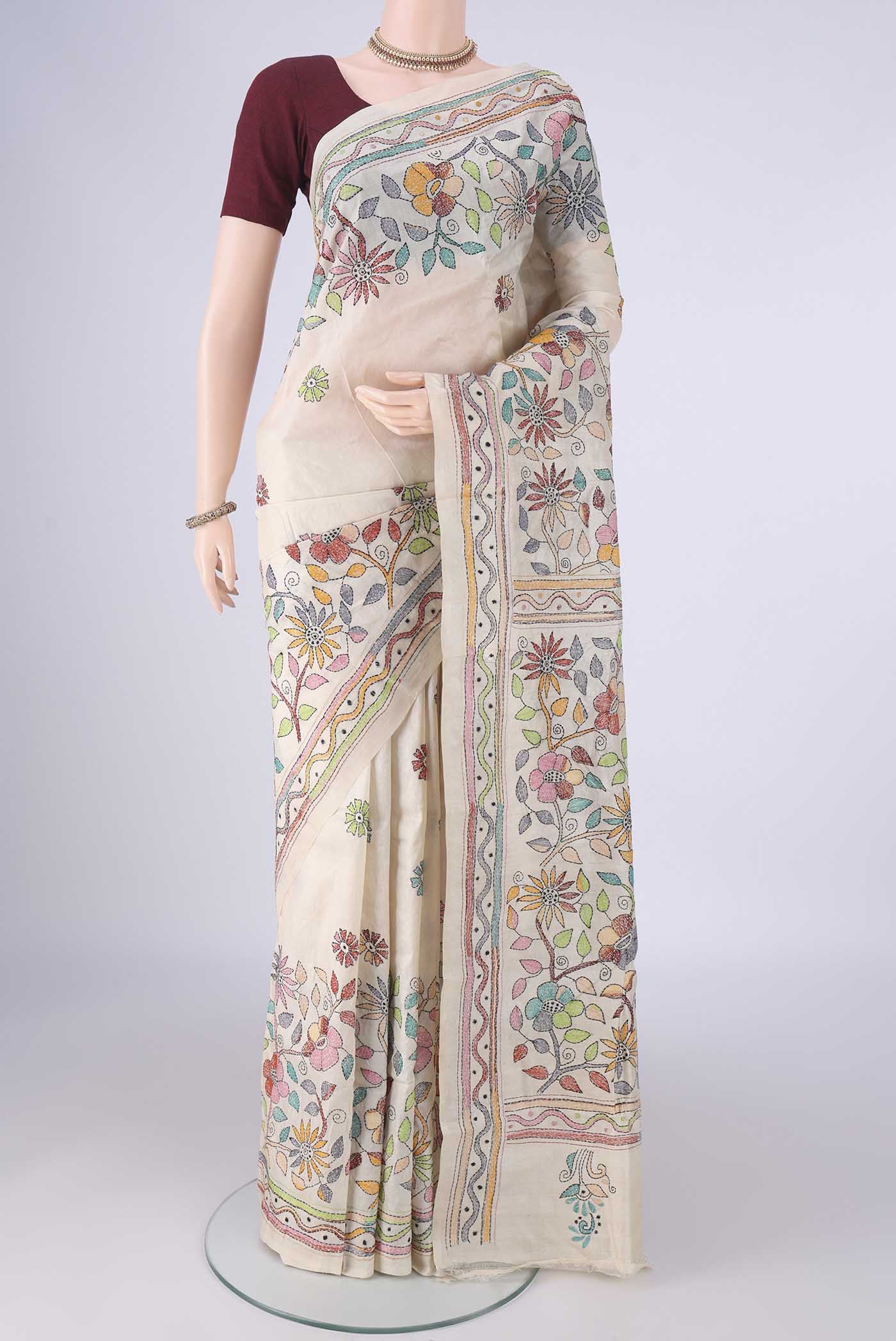 Beige Tussar Silk Saree with Kantha Work on the body and Thread Border.  displayed on a mannequin