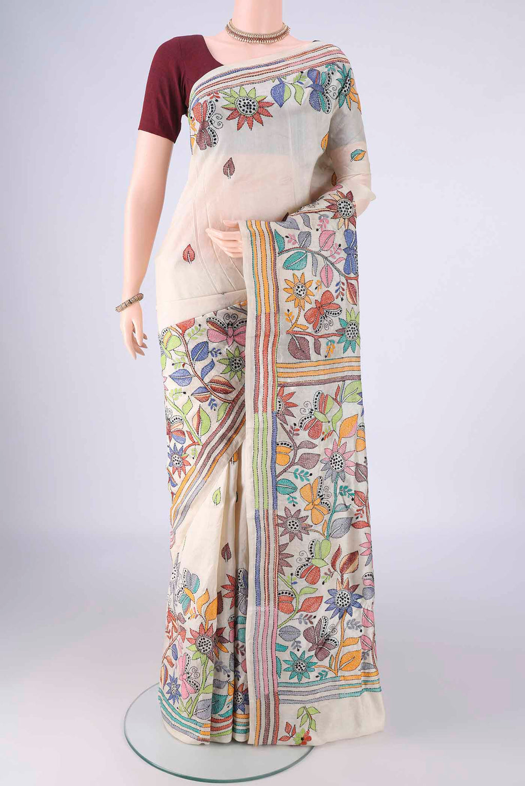 Beige Tussar Silk Saree with Kantha Work on the body and Thread Border.  displayed on a mannequin