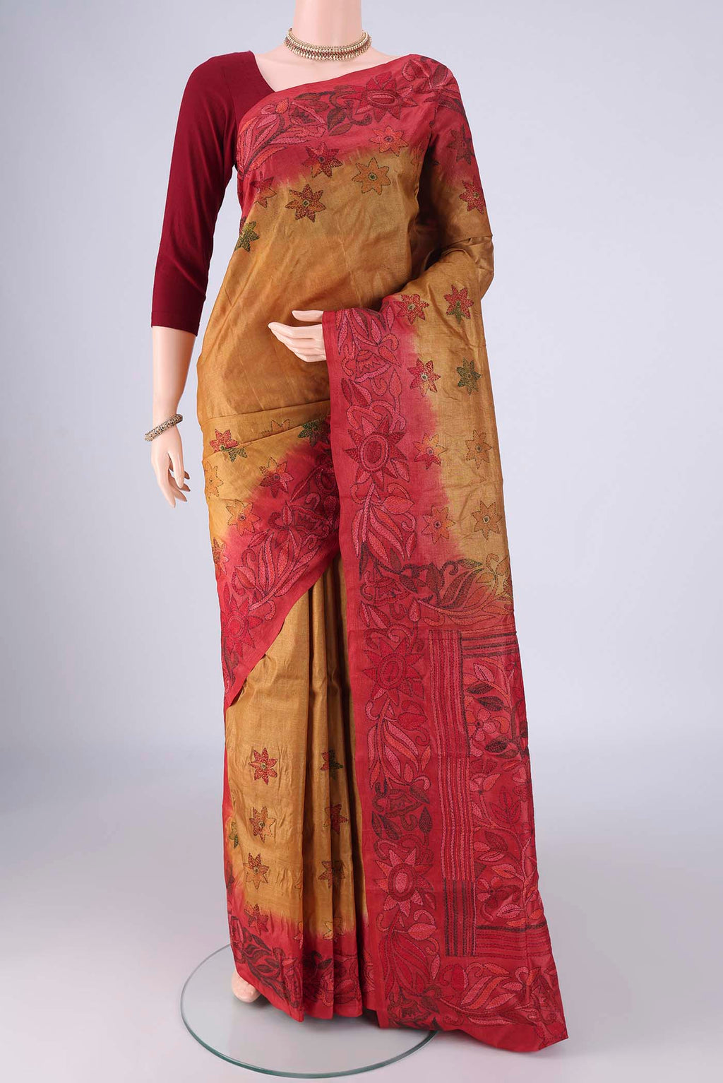 Golden Tussar Silk Saree with Kantha Work on the body and Thread Border.  displayed on a mannequin