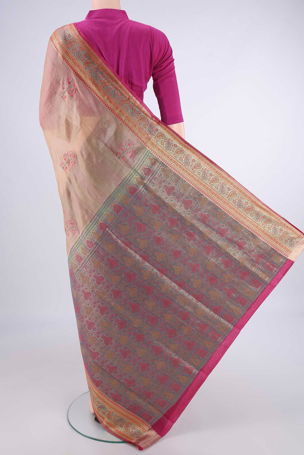 Flat view of Beige Banarasi Tussar Silk Saree with Embroidery on the body and Zari Border. 